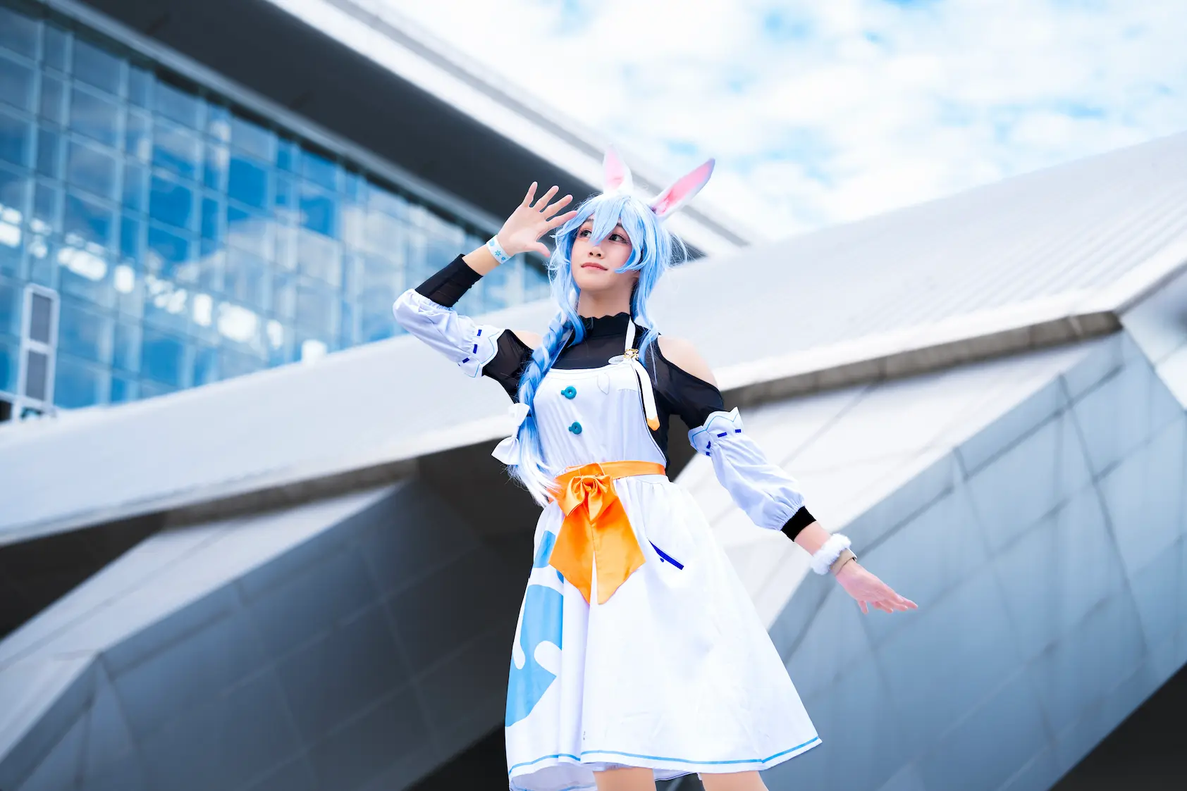 SaltyAom's pekomama cosplay smiling at the camera