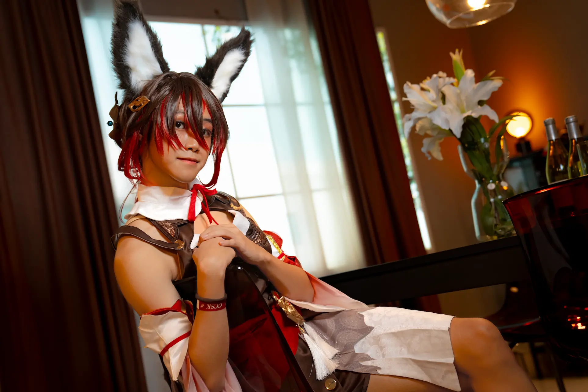 SaltyAom's Tingyun cosplay holding both hands resting on the chest